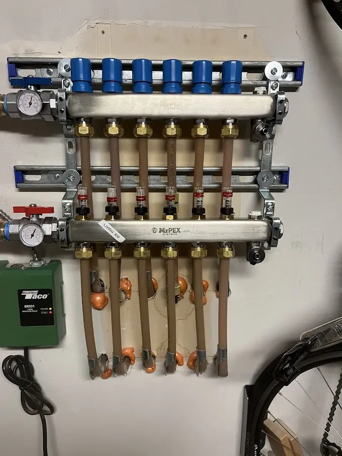 Plumber performing Gas Line Installation at a residential property in Boxford